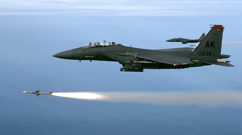 F-15 Fighter Jet Launching Missile — Blue, Dramatic