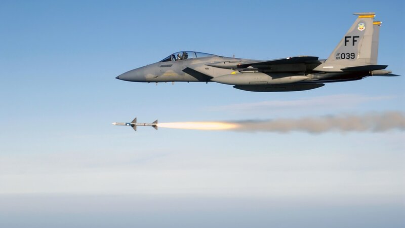 F-15 Fighter Jet Launching Missile — Blue