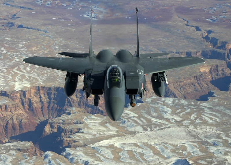 F-15 fighter jet over canyon