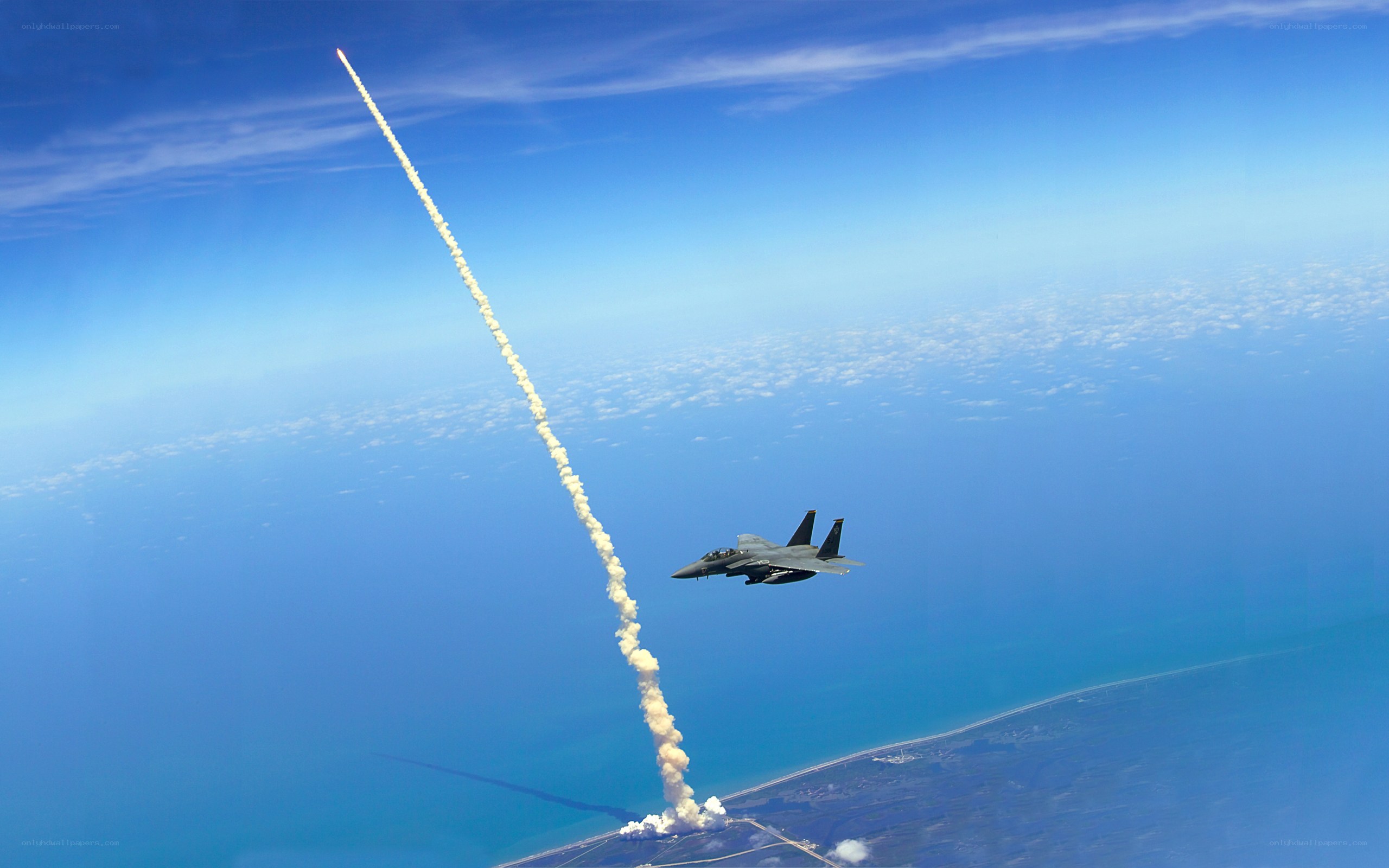F-15 fighter jet with rocket launch