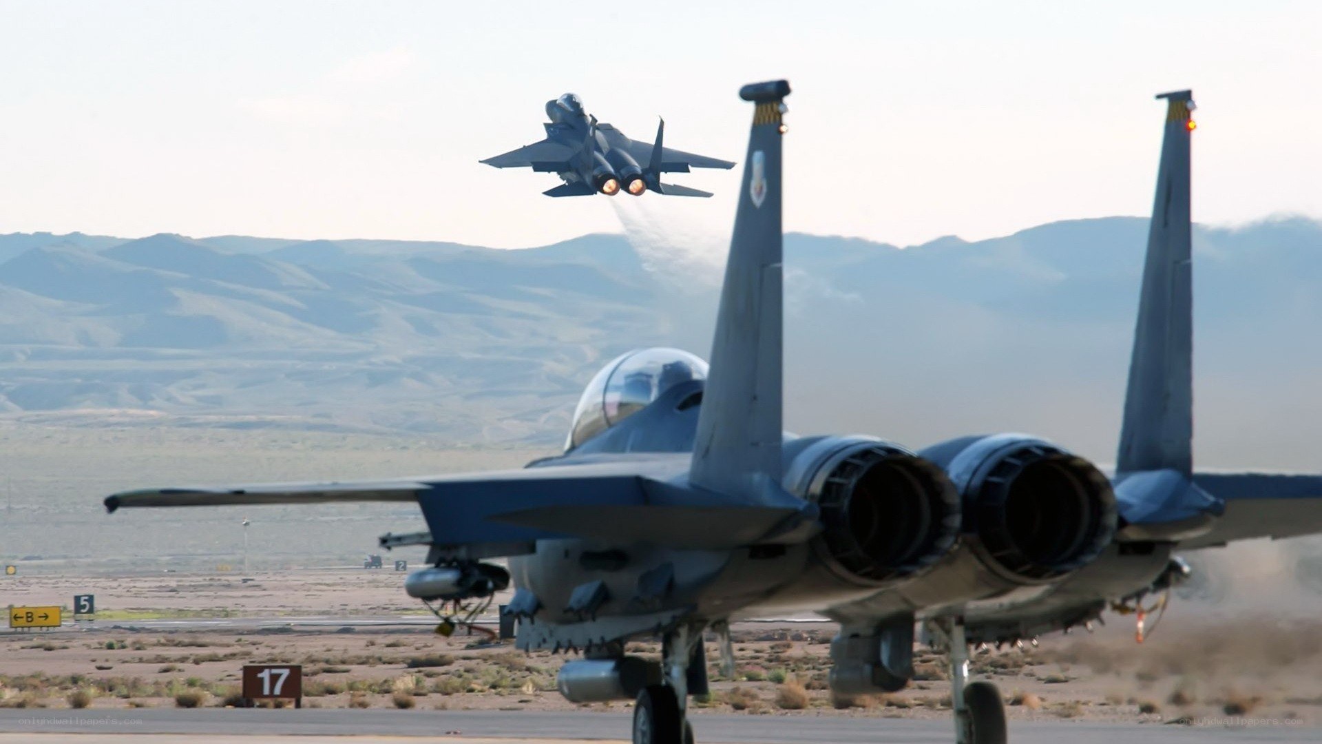 F-15 fighter jets on a runway