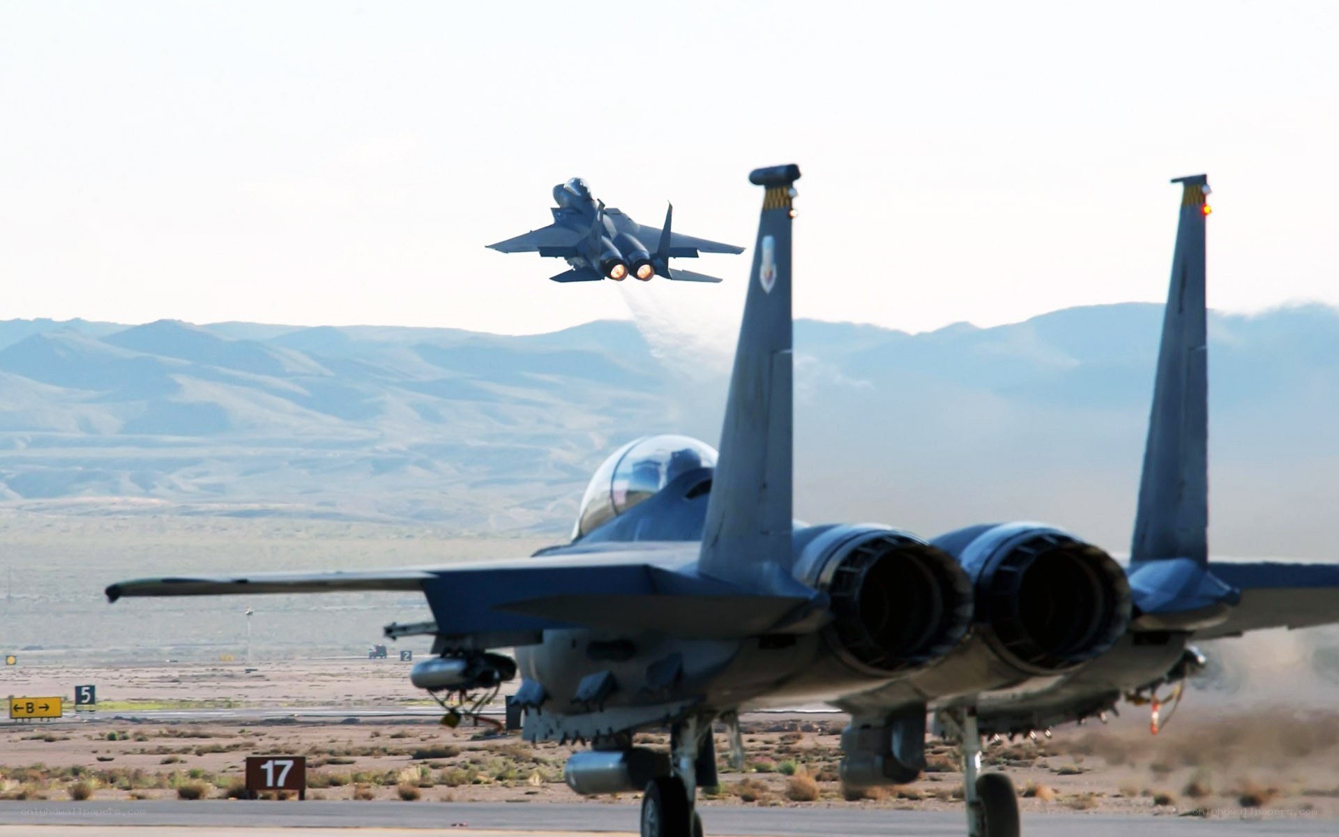 F-15 fighter jets on a runway