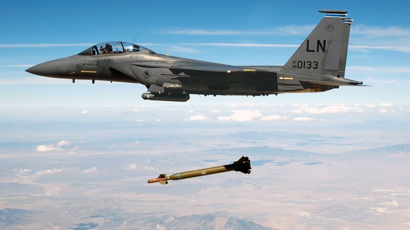 F-15E Fighter Jet — Gray, Dramatic, Afternoon, Photograph, Missile, Clouds