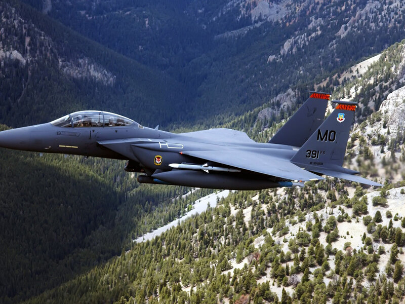 F-15E Fighter Jet — Gray, Dramatic, Afternoon, Photograph, Mountains