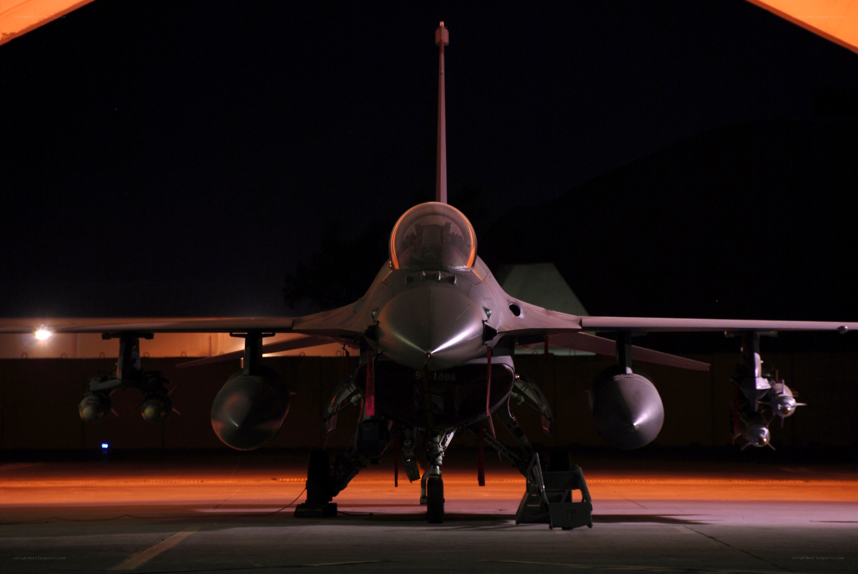 F-16 fighter jet at night