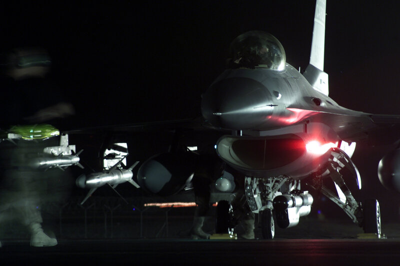 F-16 fighter jet at night
