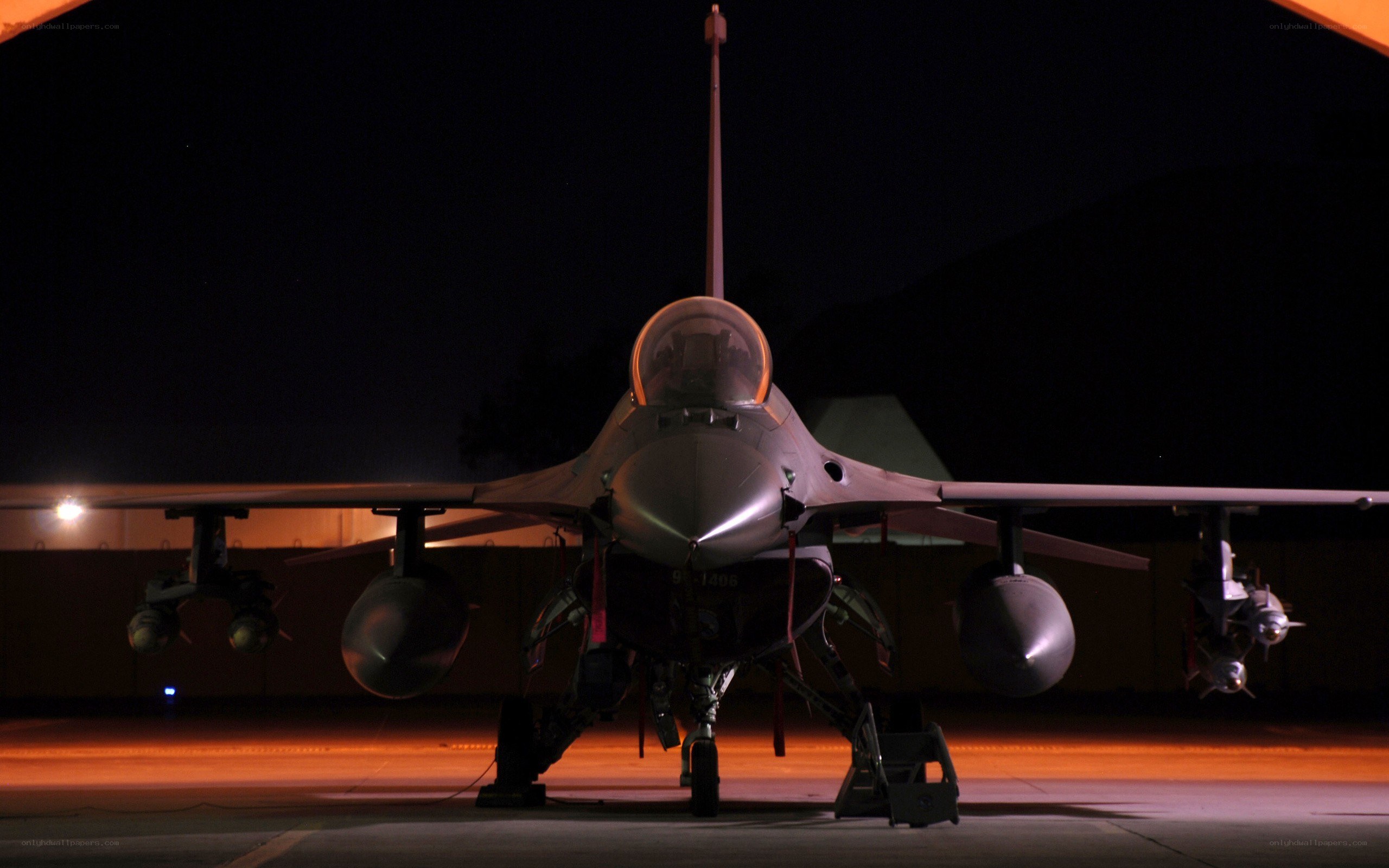 F-16 fighter jet at night
