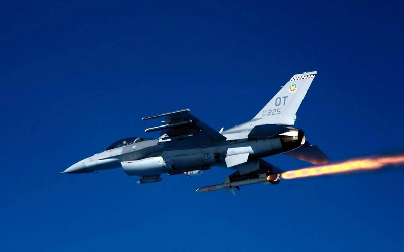 F-16 Fighter Jet — Blue, Dramatic, Afternoon, Photograph, Missile