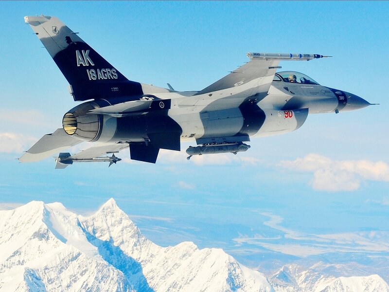 F-16 Fighter Jet — Blue, Dramatic, Afternoon, Photograph, Mountains