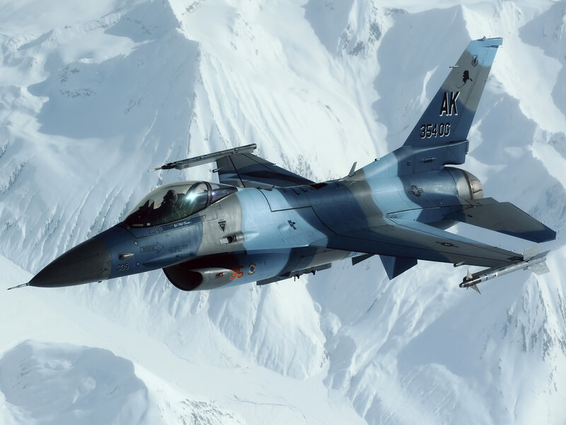 F-16 Fighter Jet — Blue, Dramatic, Winter, Photograph, Snowy Mountains, Pilot