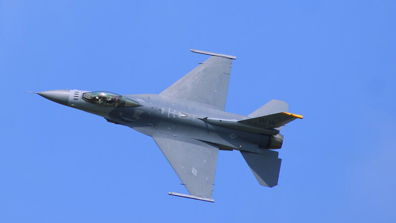 F-16 Fighter Jet — Blue, Dynamic, Afternoon, Photograph, Aircraft, Sky, Pilot