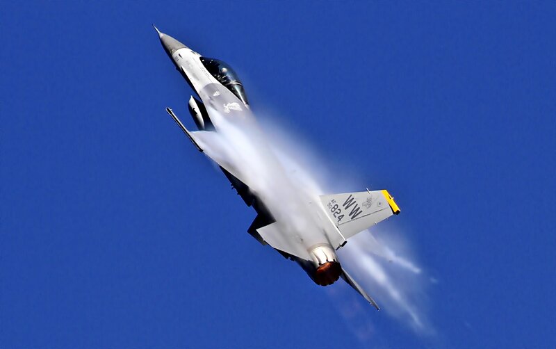 F-16 Fighter Jet — Blue, Dynamic, Photograph, Clouds