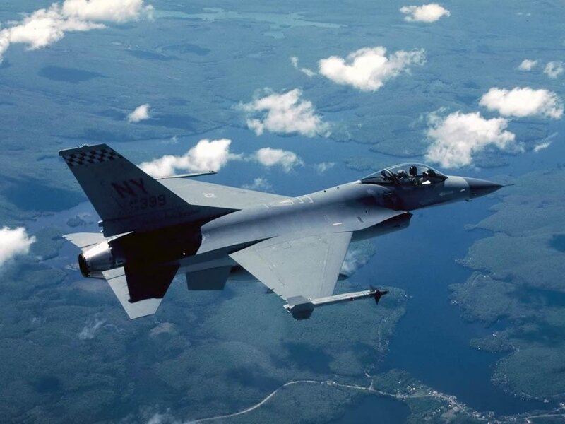 F-16 Fighter Jet — Gray, Aerial, Afternoon, Photograph, Clouds, Land