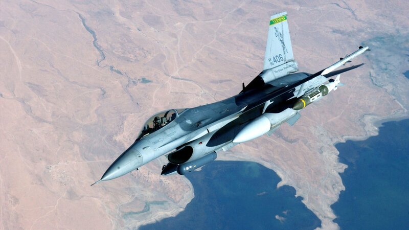 F-16 Fighter Jet — Gray, Aerial, Photograph, Desert Landscape