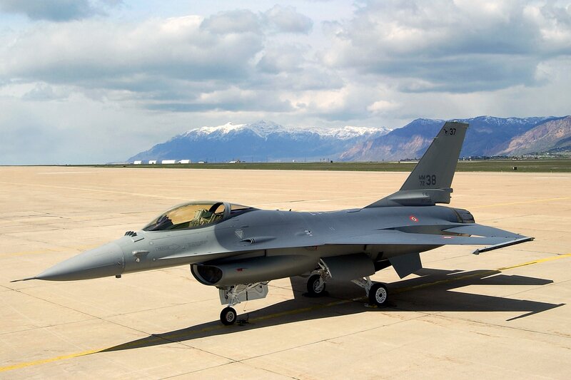 F-16 Fighter Jet — Gray, Dramatic, Afternoon, Photograph, Airfield