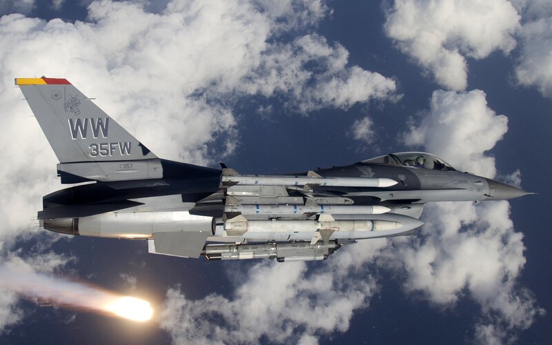 F-16 Fighter Jet — Gray, Dramatic, Afternoon, Photograph, Clouds, Missiles