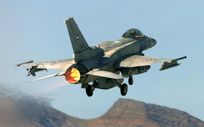 F-16 Fighter Jet — Gray, Dramatic, Afternoon, Photograph, Mountain