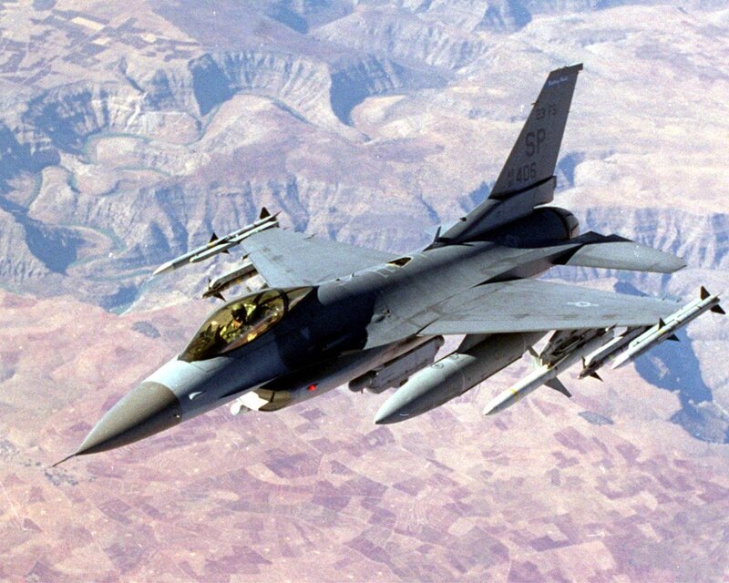 F-16 Fighter Jet — Gray, Dramatic, Afternoon, Photograph, Mountainous Terrain, Missiles, Brown