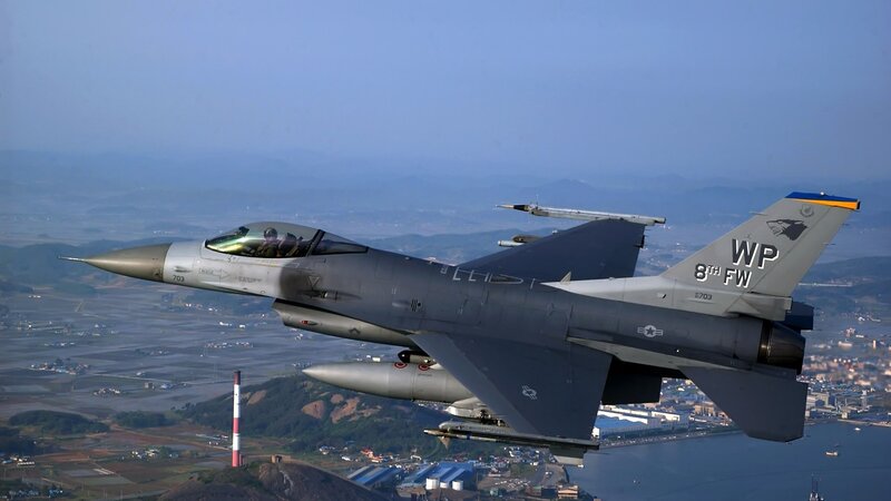 F-16 Fighter Jet — Gray, Dramatic, Afternoon, Photograph, Pilot