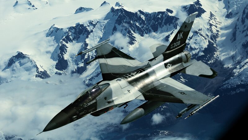 F-16 Fighter Jet — Gray, Dramatic, Photograph, Mountains