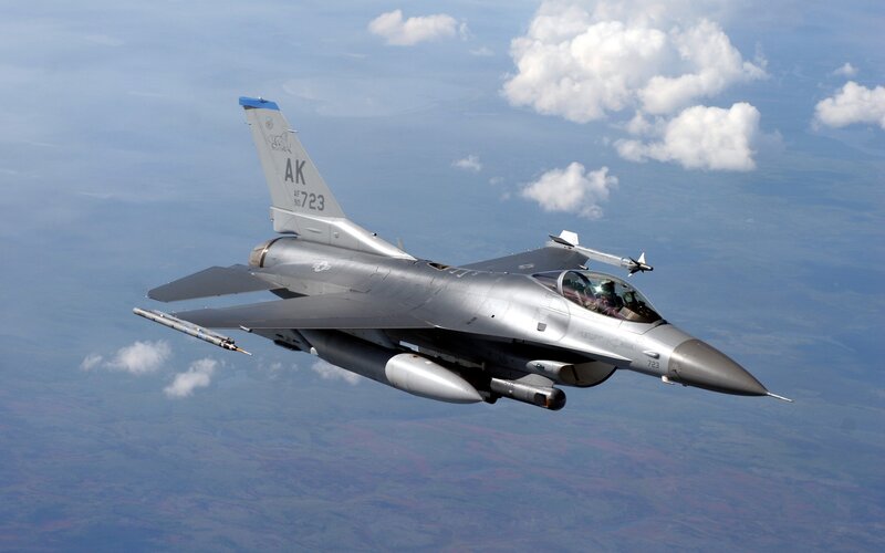 F-16 Fighter Jet — Gray, Dynamic, Afternoon, Photograph, Clouds, Sky, Pilot