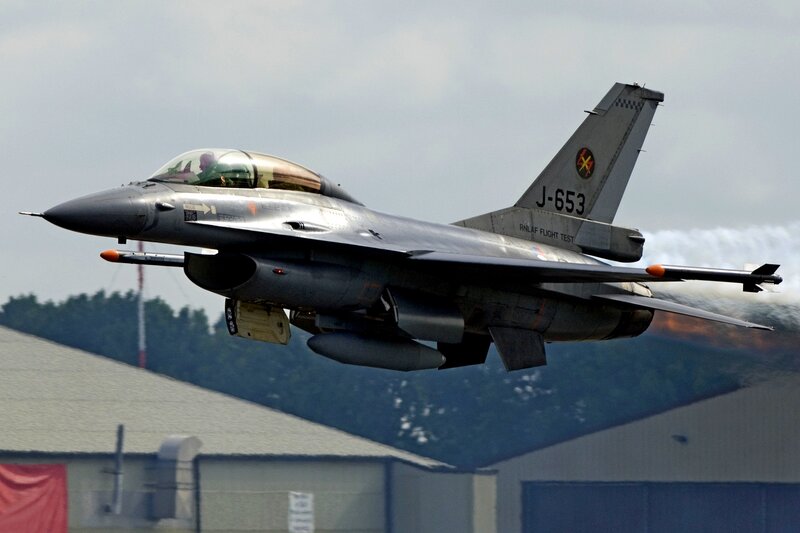F-16 Fighter Jet — Gray, Dynamic, Afternoon, Photograph, Pilot