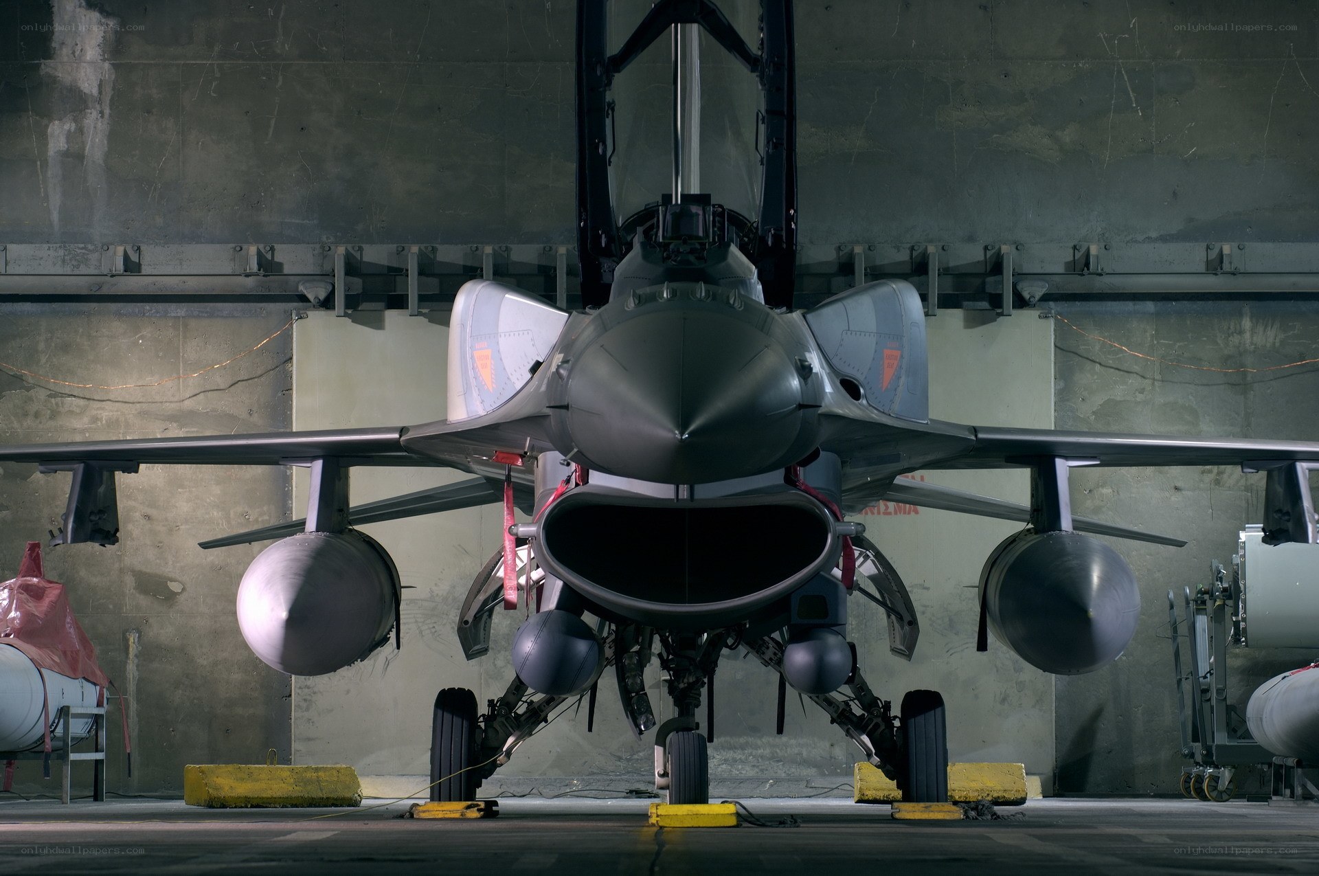F-16 fighter jet in hangar