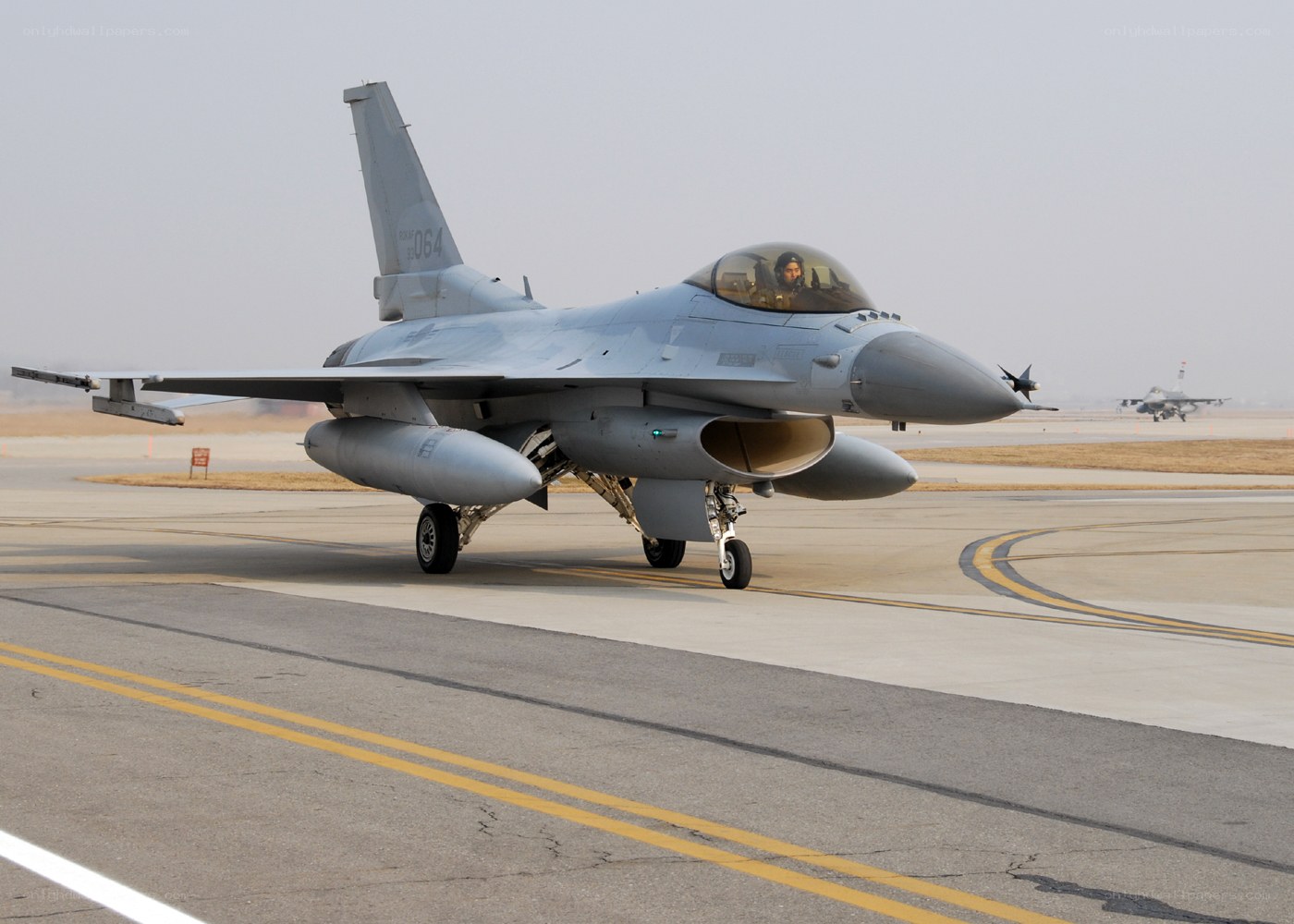 F-16 fighter jet on runway