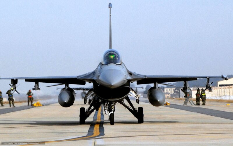 F-16 Fighter Jet on Runway — Gray, Dramatic