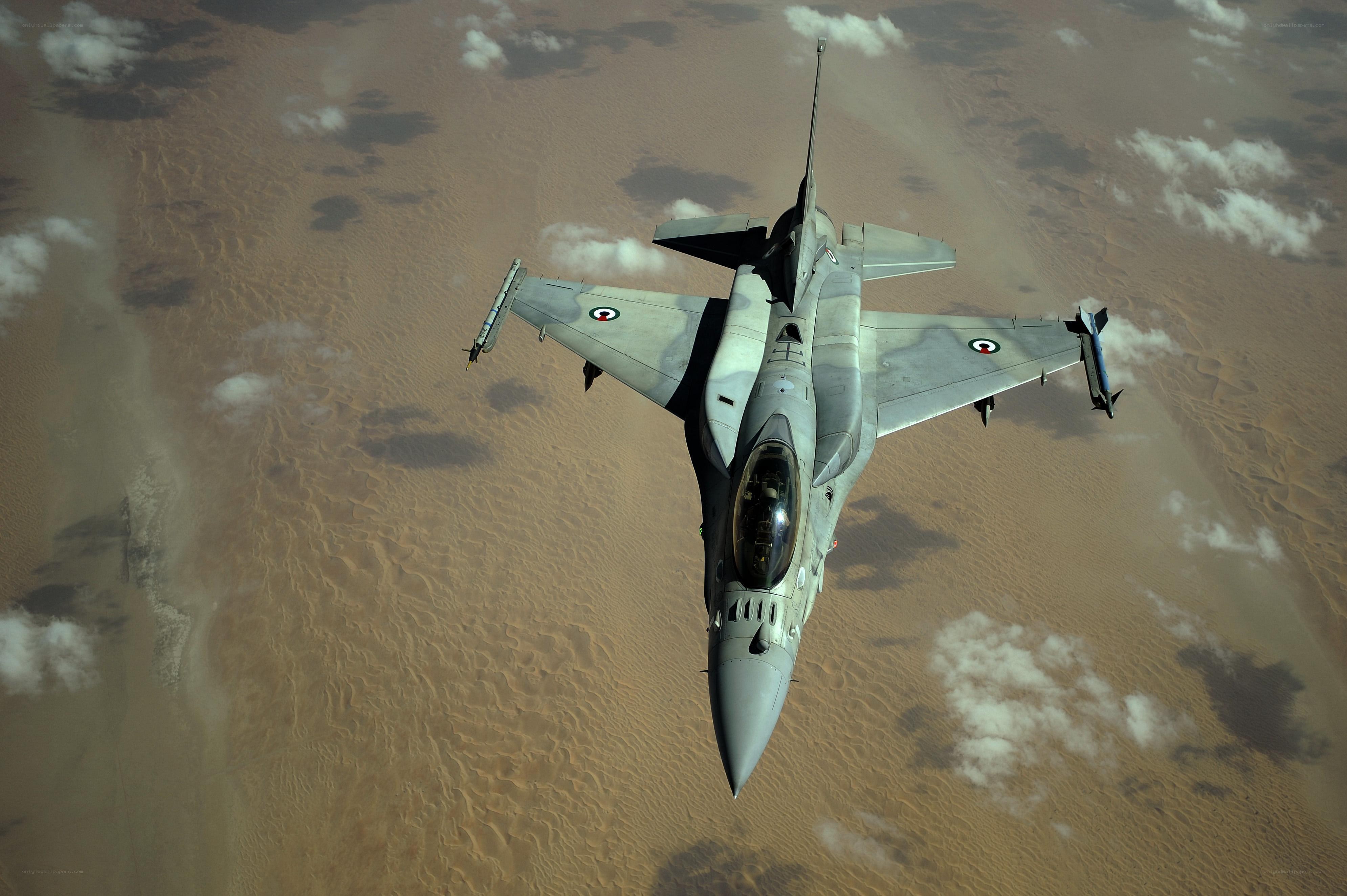 F-16 fighter jet over desert
