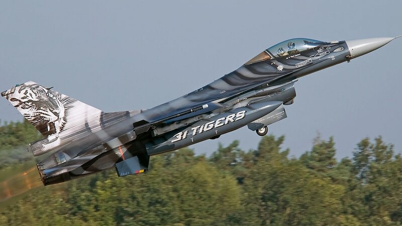F-16 fighter jet with tiger livery