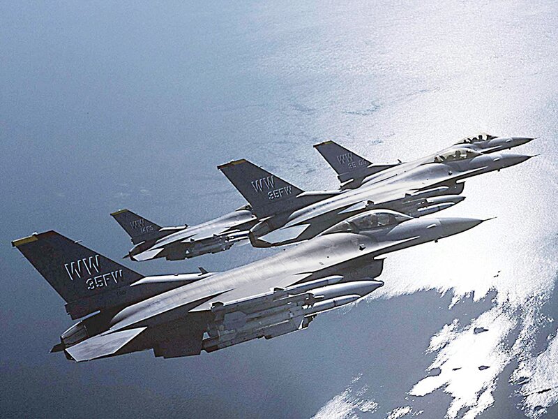 F-16 Fighter Jets in Formation — Gray, Dramatic, Afternoon, Photograph, Aircraft, Ocean