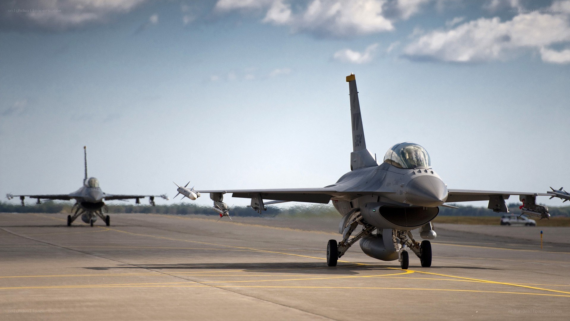 F-16 fighter jets on a runway