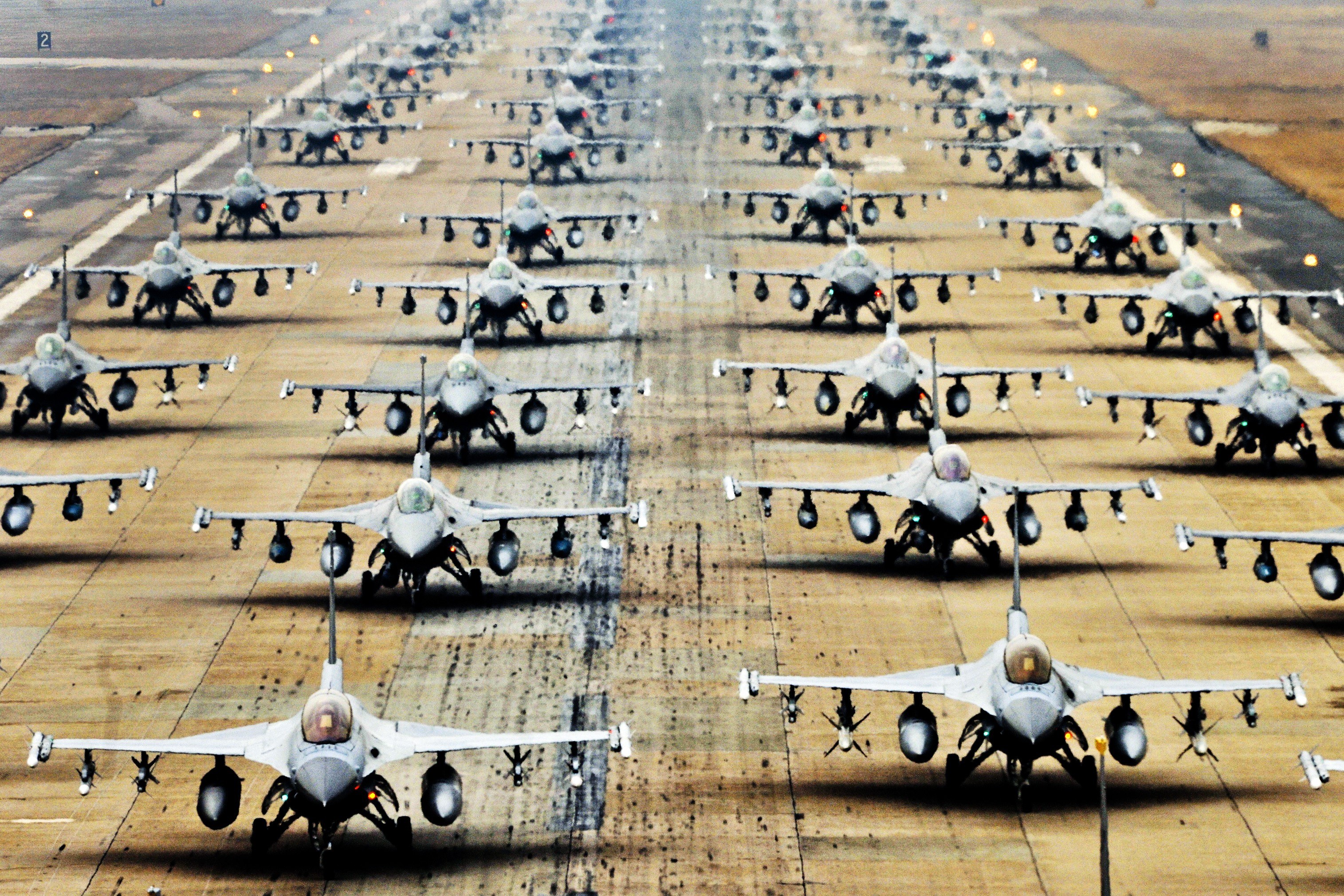 F-16 fighter jets on a runway