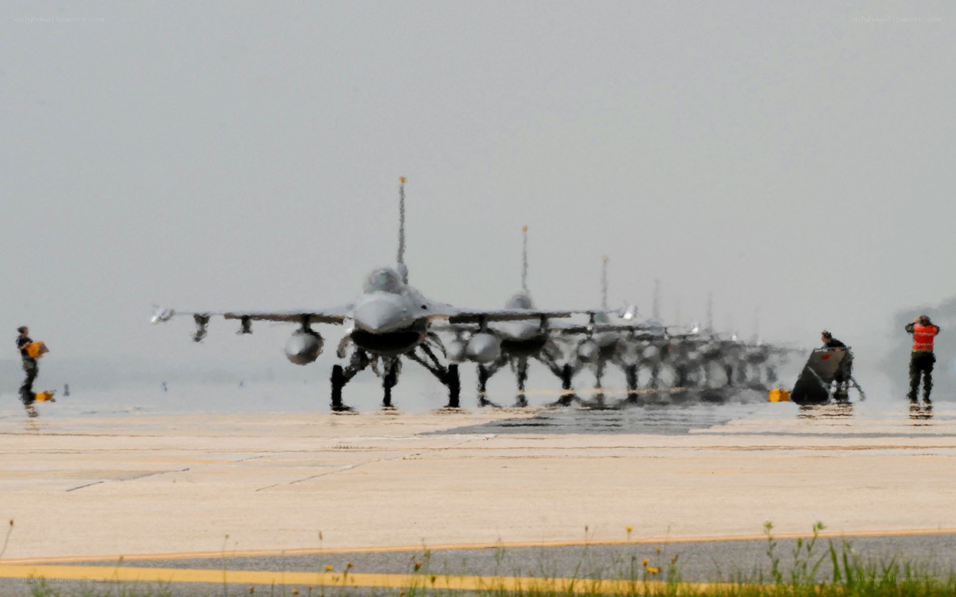 F-16 fighter jets on a runway