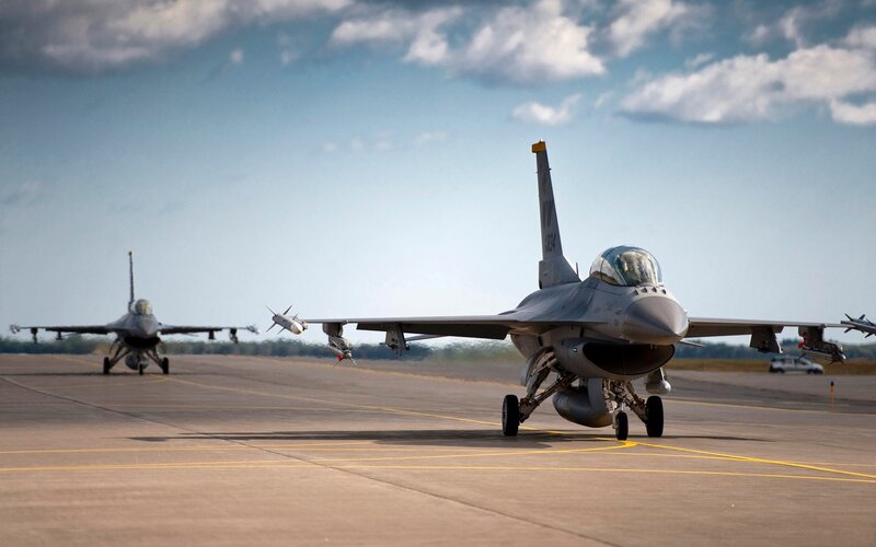 F-16 Fighter Jets on Runway — Gray, Dramatic, Afternoon, Photograph