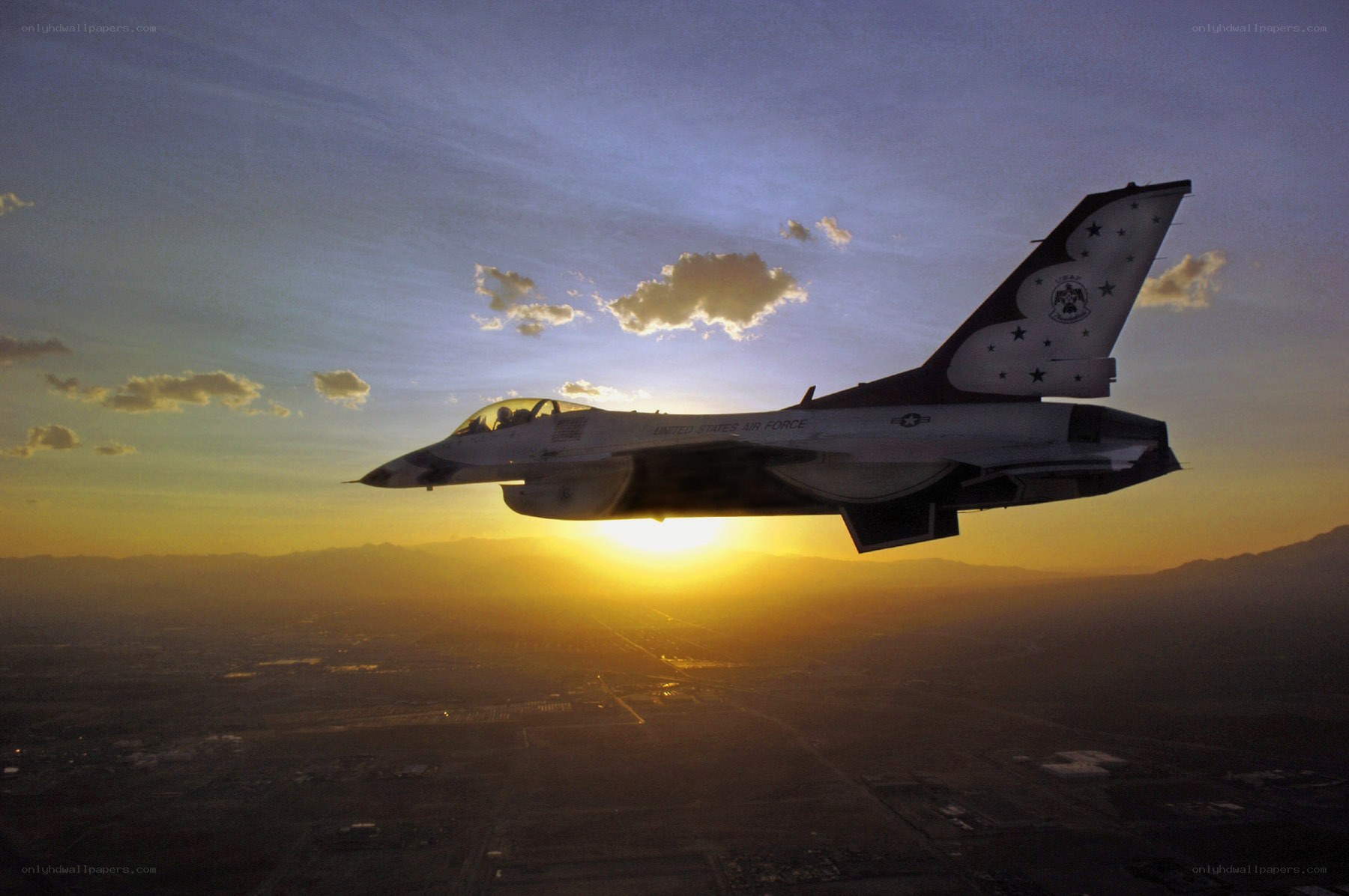 F-16 jet in sunset flight