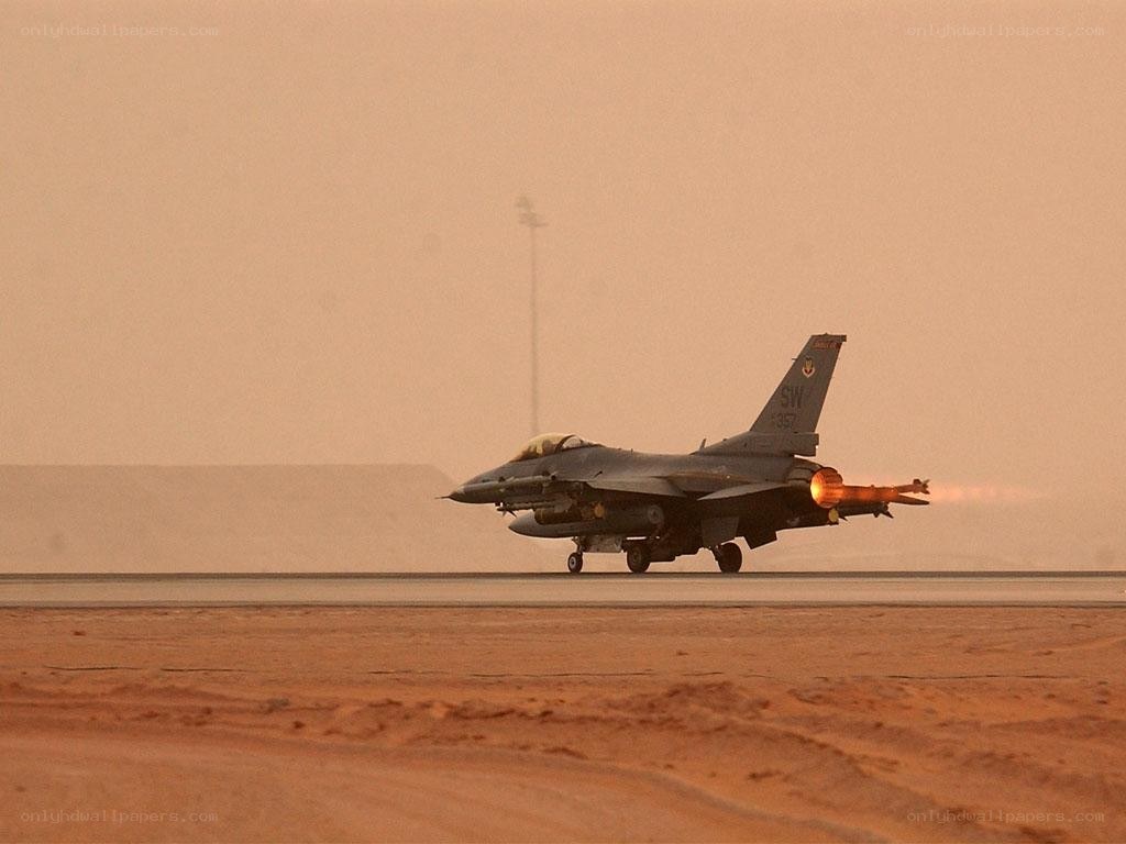 F-16 jet on desert runway