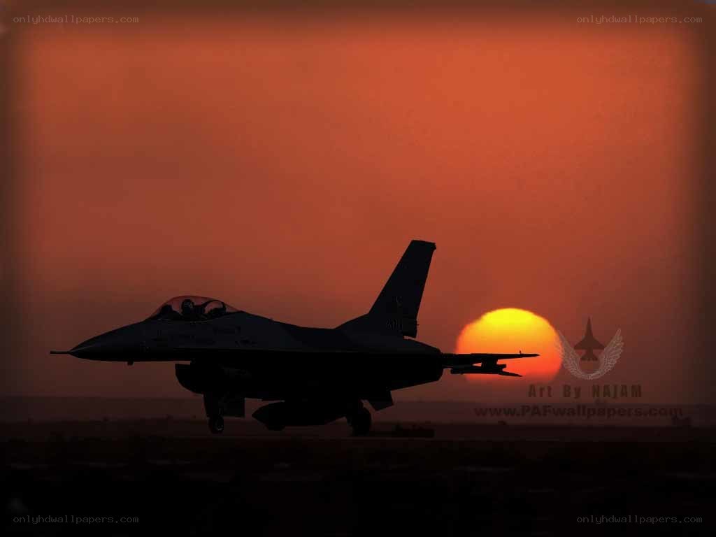 F-16 silhouette at sunset