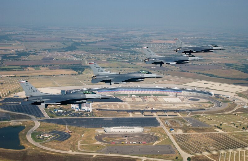 F-16s over a racetrack