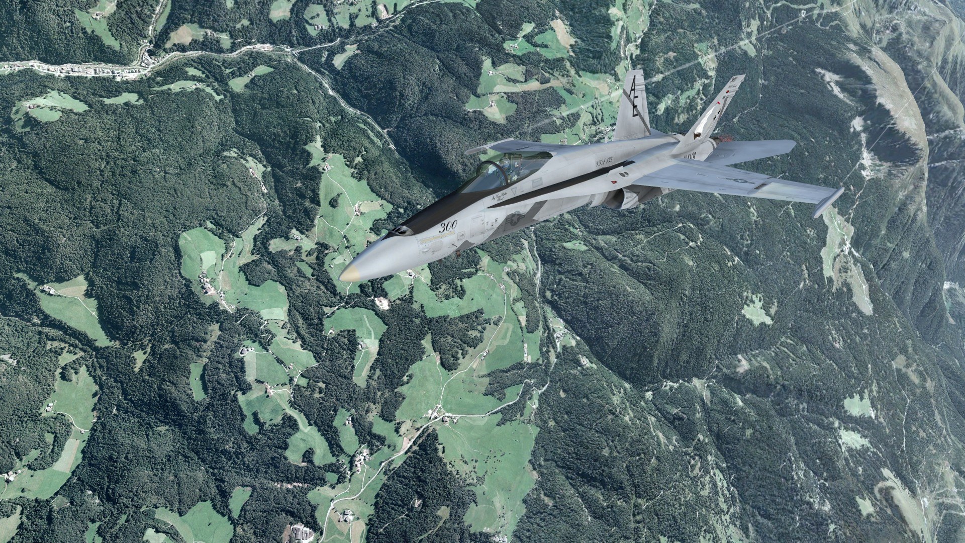 F-18 Hornet over mountainous terrain