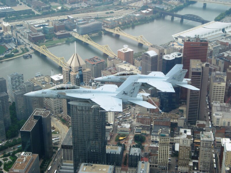 F-18 jets over a city