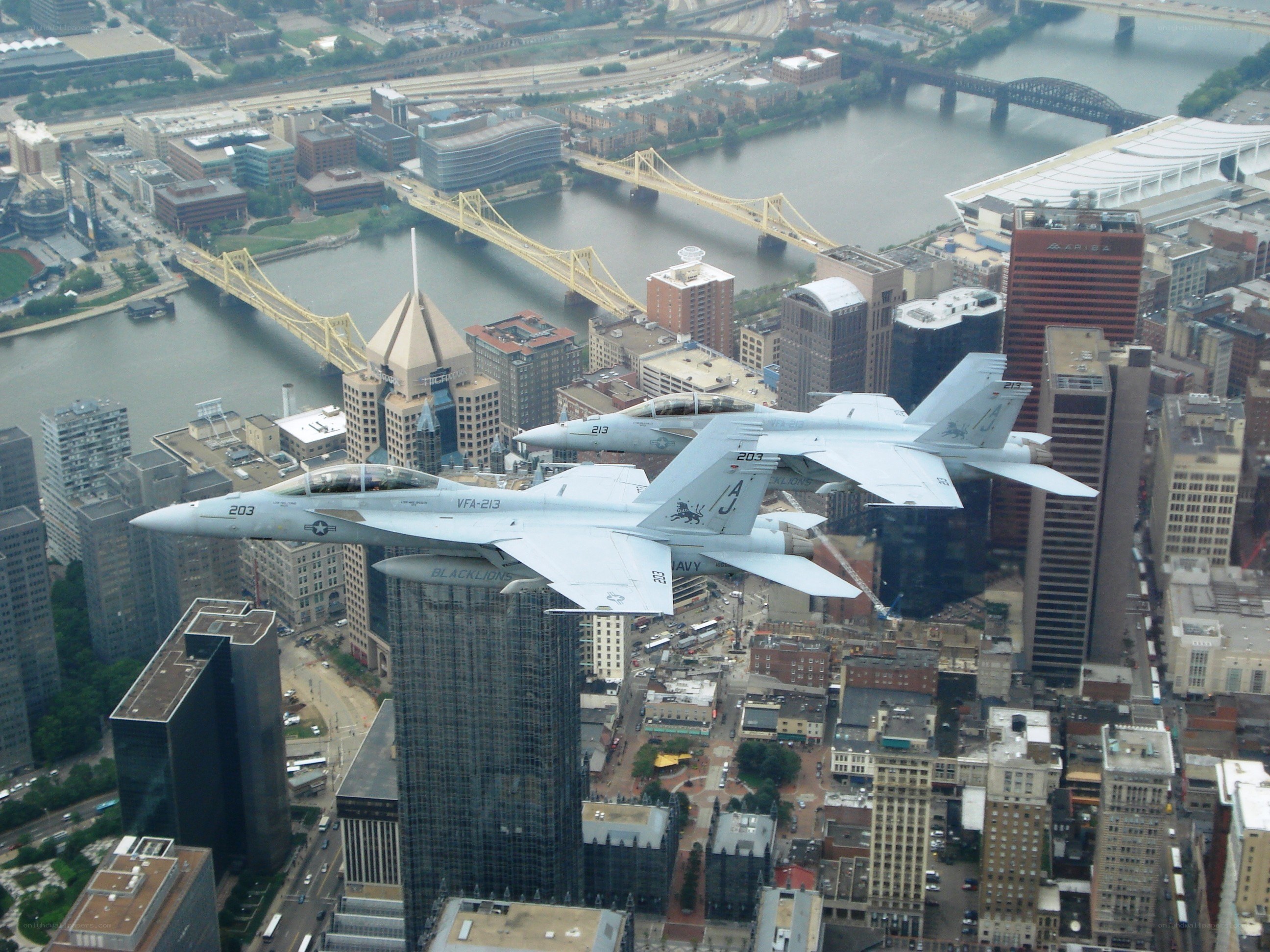 F-18 jets over a city