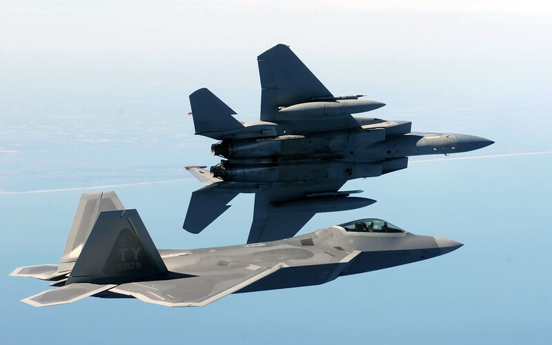 F-22 and F-15 Fighter Jets — Gray