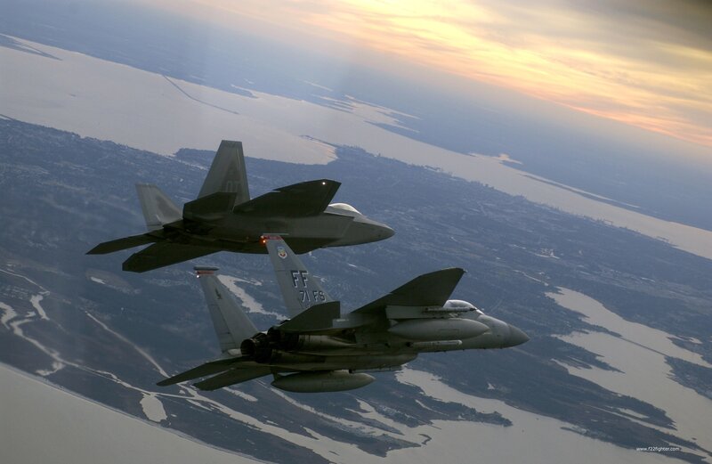 F-22 and F-15 fighter jets in flight