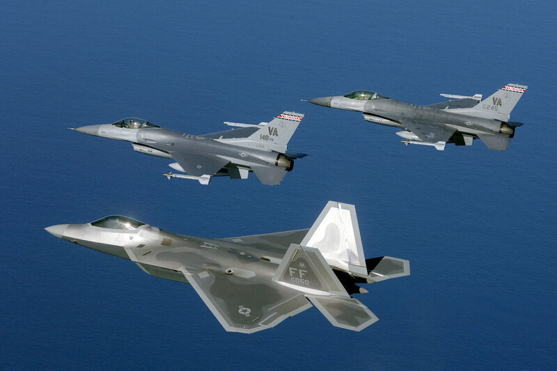 F-22 and F-16 fighter jets in formation