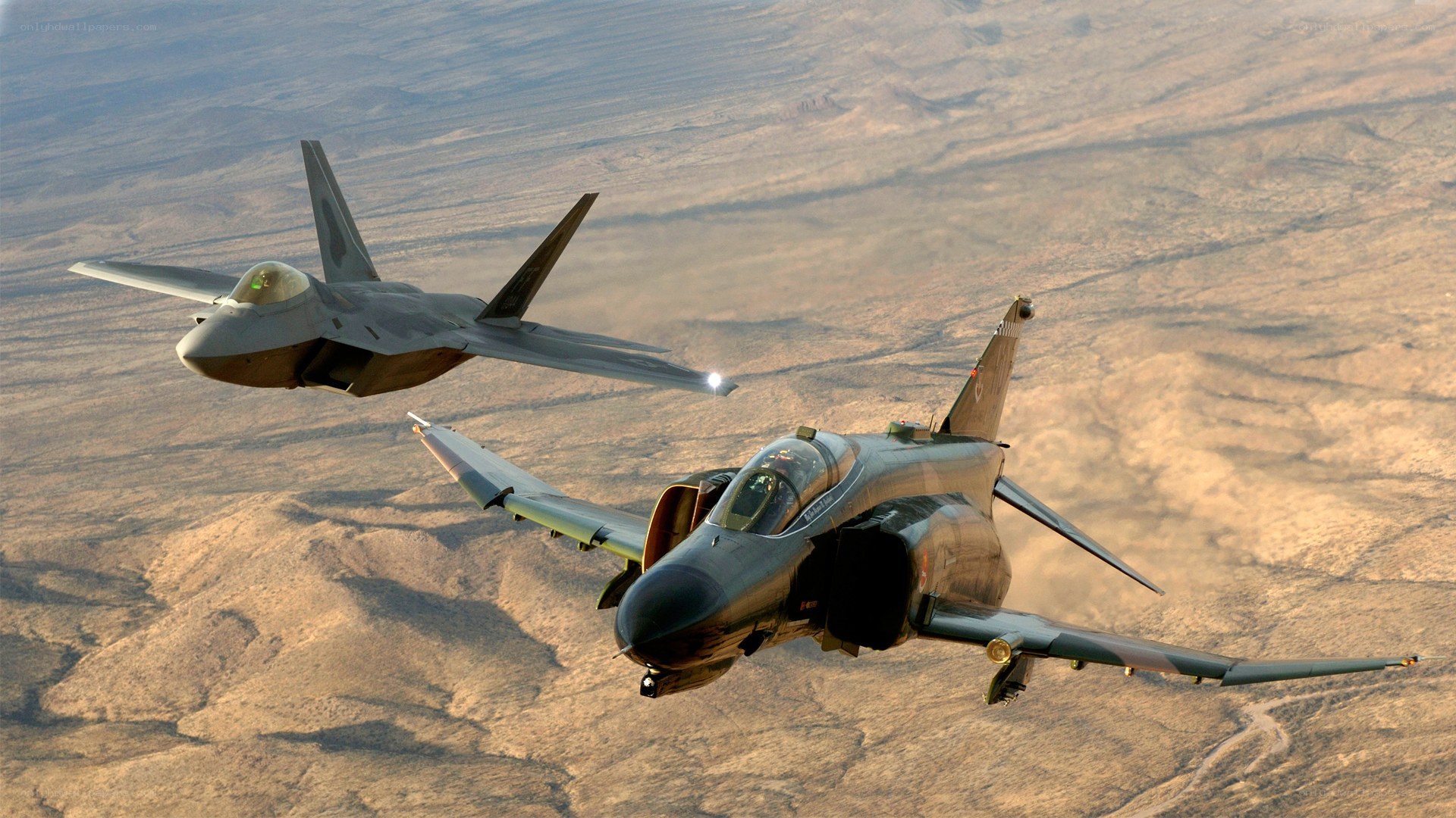 F-22 and F-4 in flight