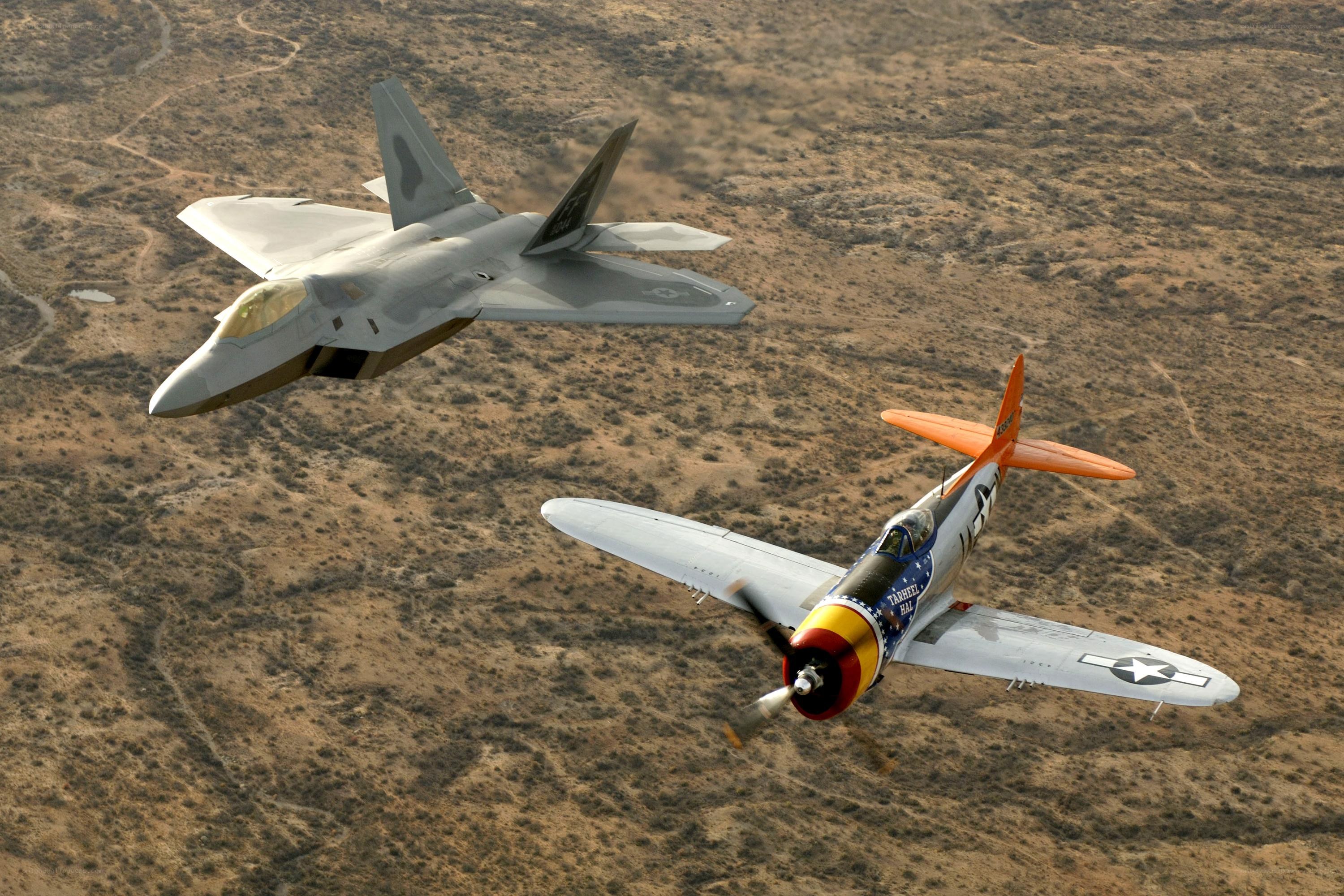 F-22 and P-47 in flight