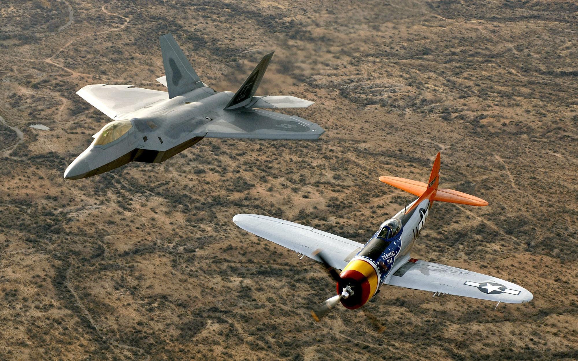 F-22 and P-47 in flight