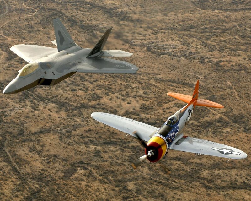 F-22 and P-47 in flight